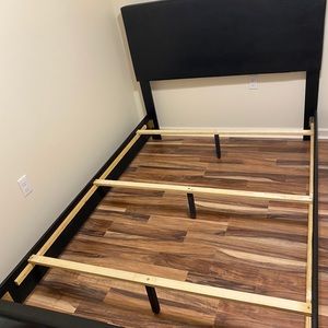 A full size bed frame.